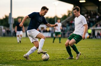 Attacker performing a step over against a defender in a one-on-one